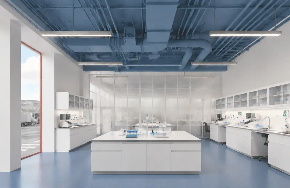 Laboratory with white benches under exposed blue services