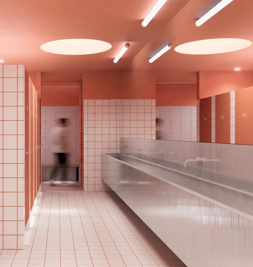 Washroom with terracotta ceiling and steel basins