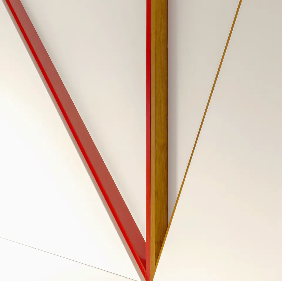 Detail of a red and timber corner