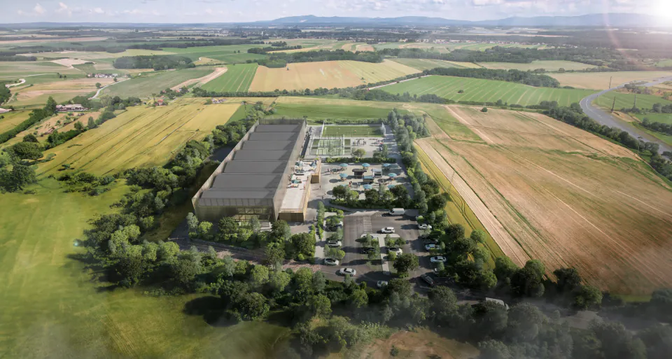 Aerial view of the padel complex among fields and woodland