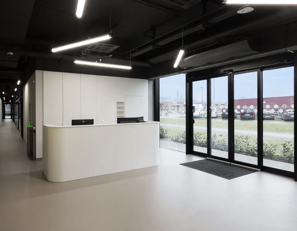 Reception desk under linear lights