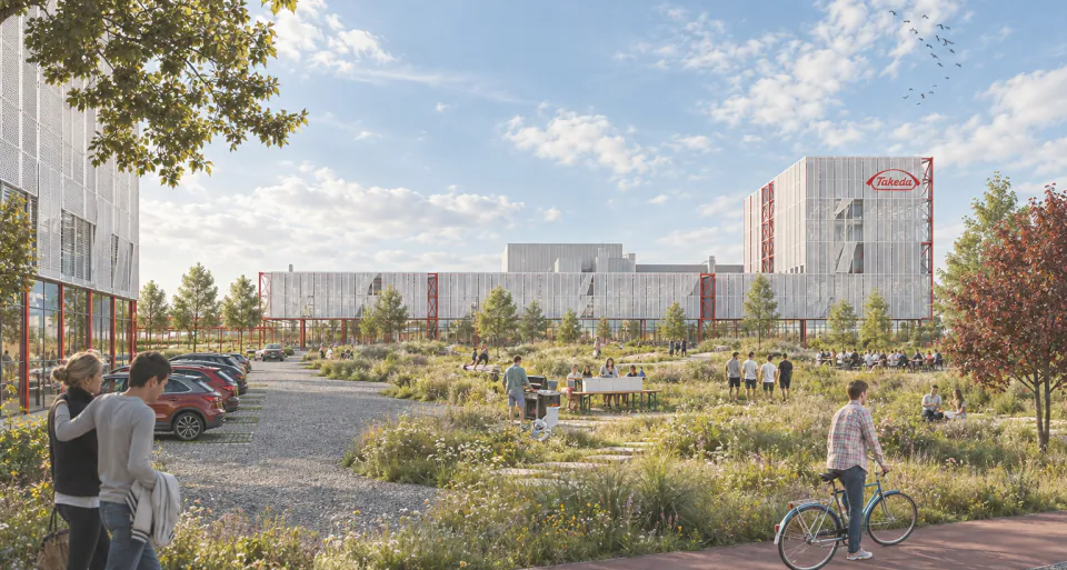 Render of the production campus with a landscaped meadow, people walking and a cyclist